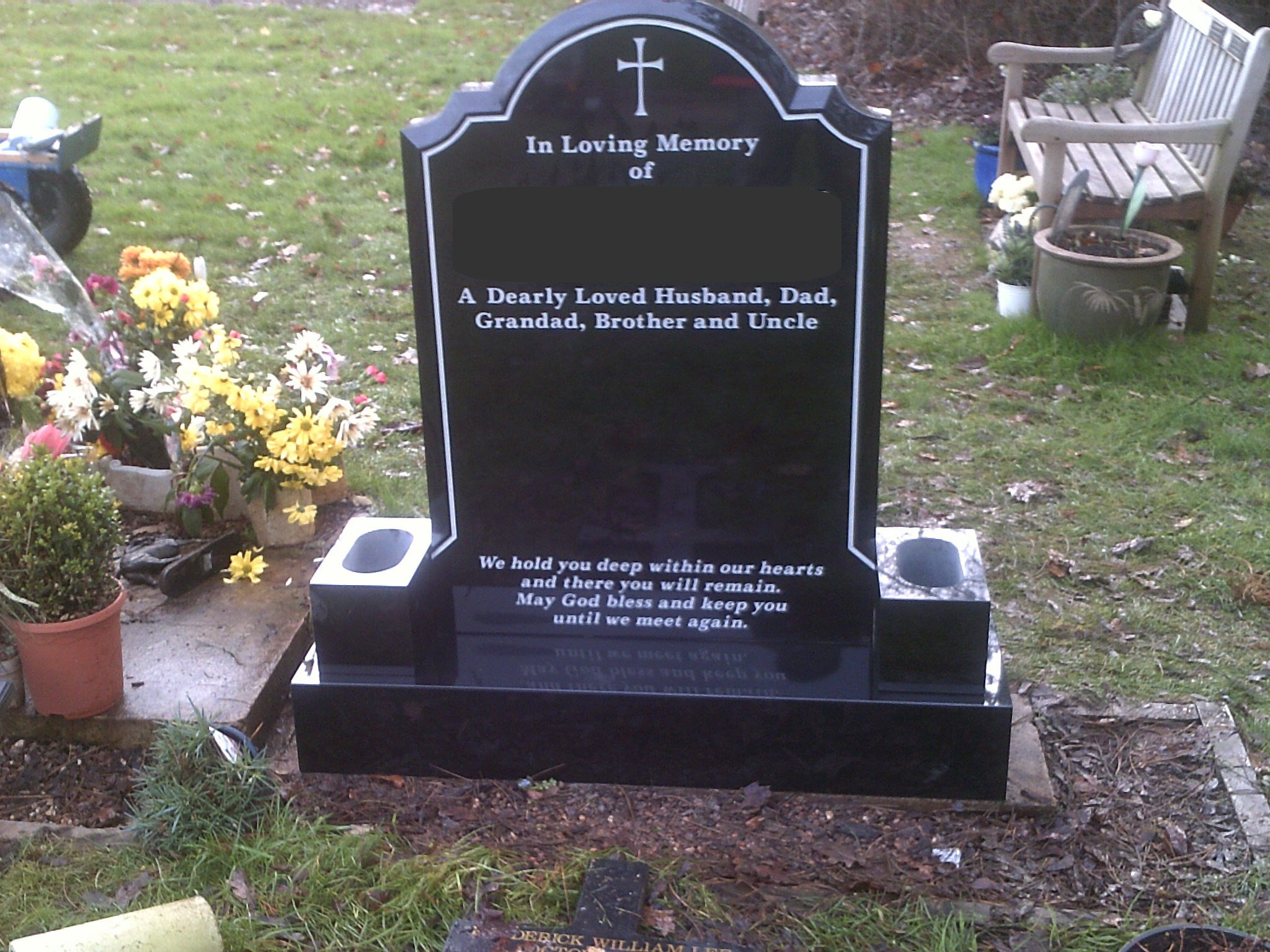 Headstone with side vases Widney Manor